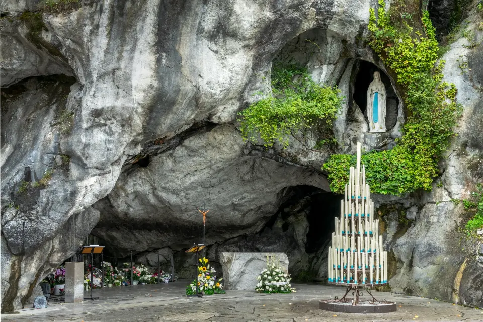 Statue of Virgin Mary in the grotto of Our Lady of Lourdes, France